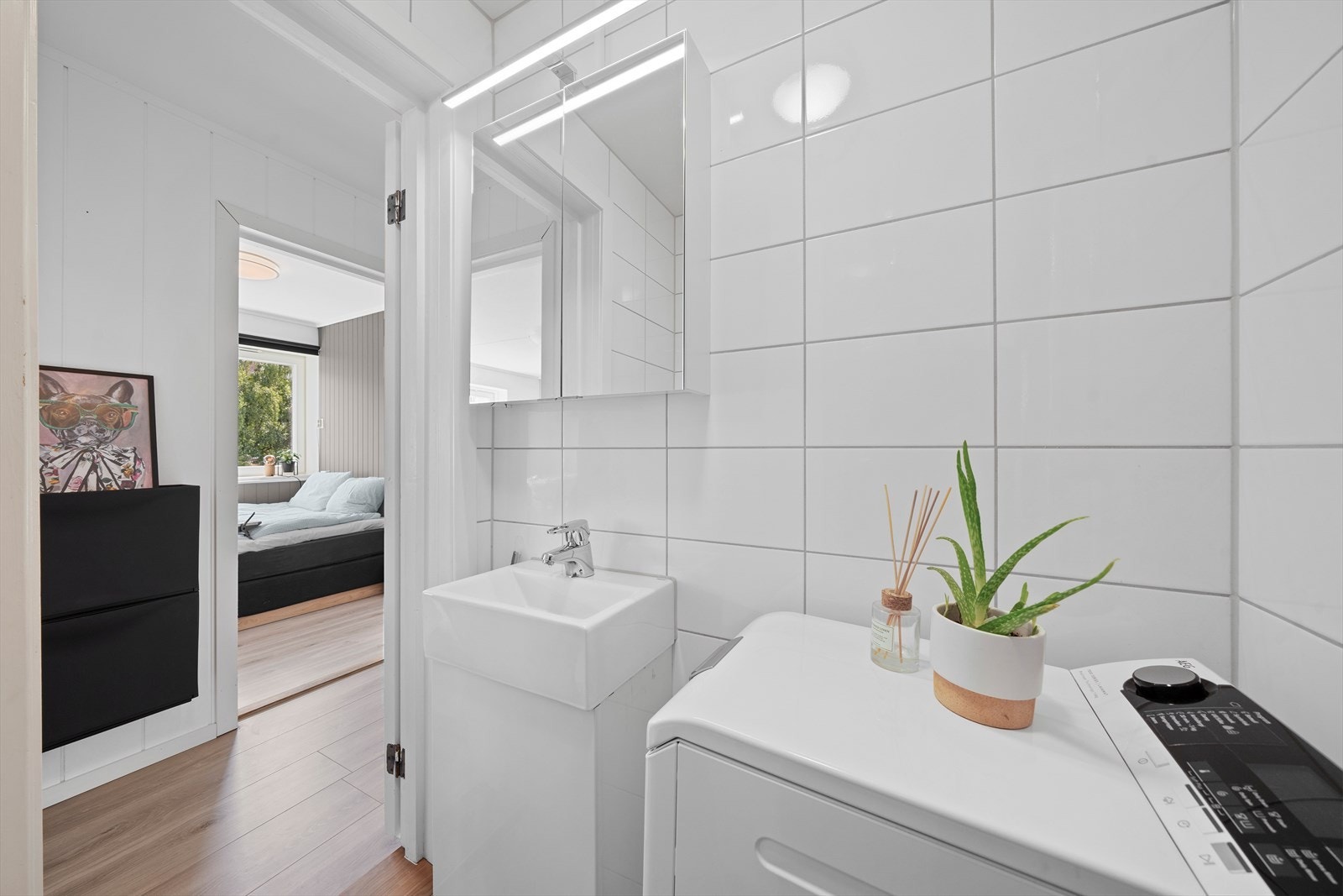 Pent flislagt bad som ble pusset opp i regi av sameiet i 2018. Galleribilde