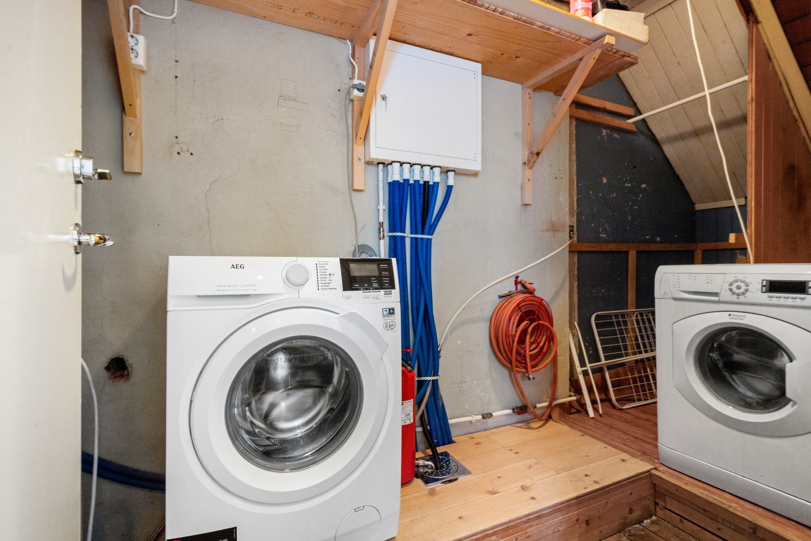 Felles vaskerom for de to toppleilighetene. Galleribilde