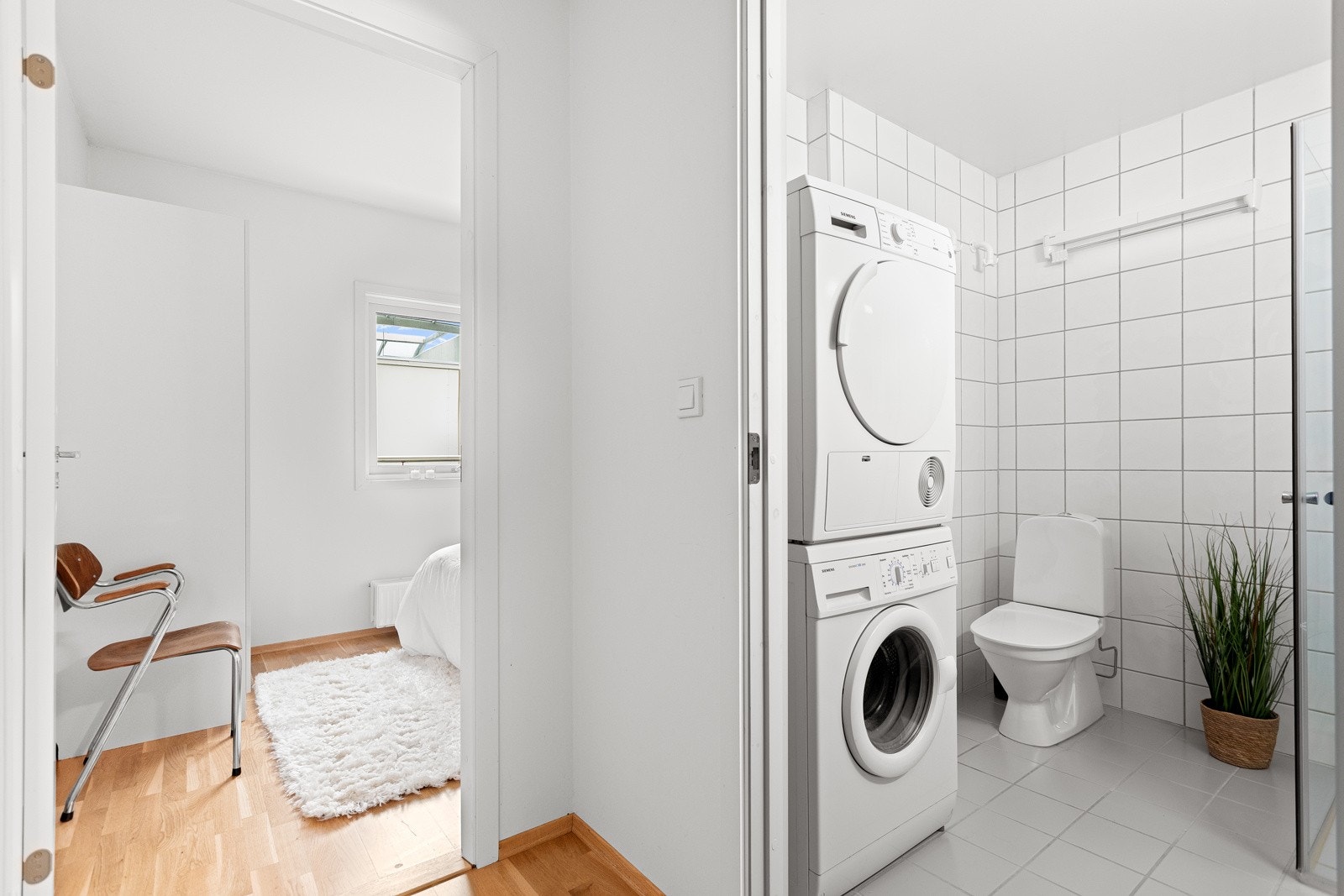 Badet har opplegg for vaskemaskin. Galleribilde