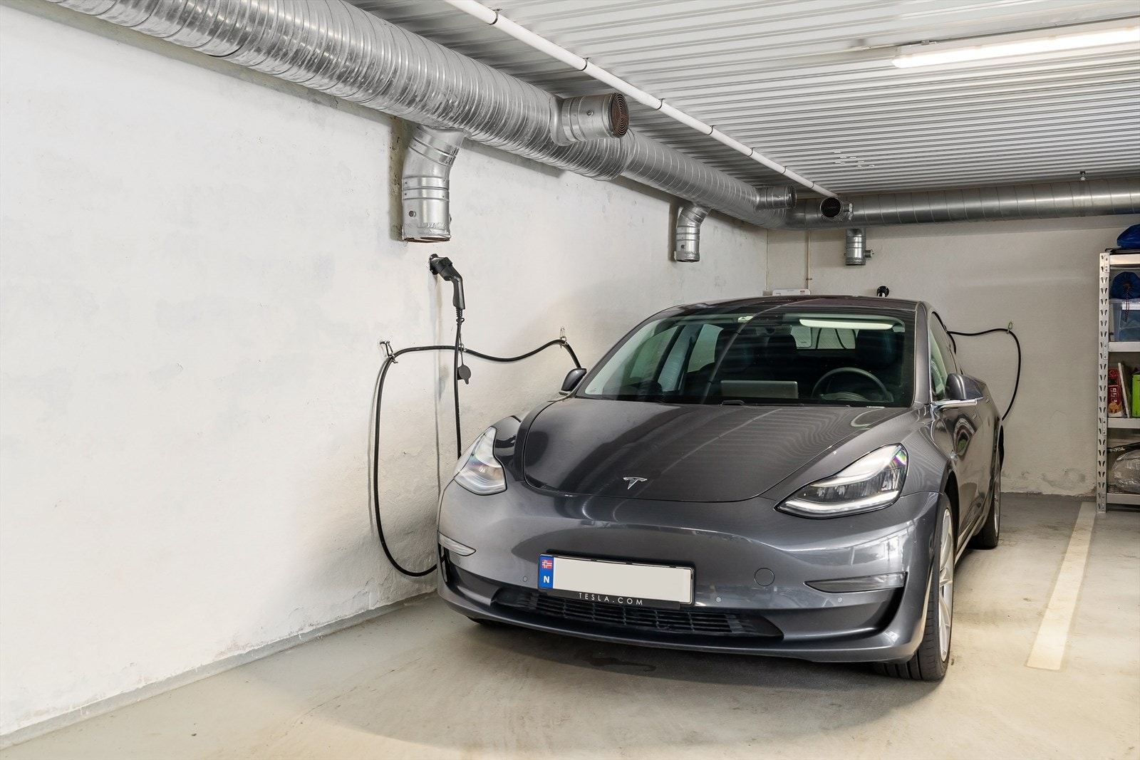 Medfølgende garasjeplass i felles anlegg med EL-lader Galleribilde