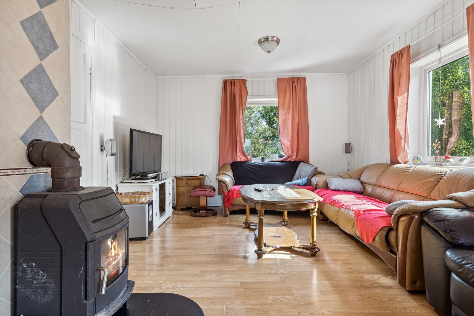 Stue med vedfyring. Galleribilde