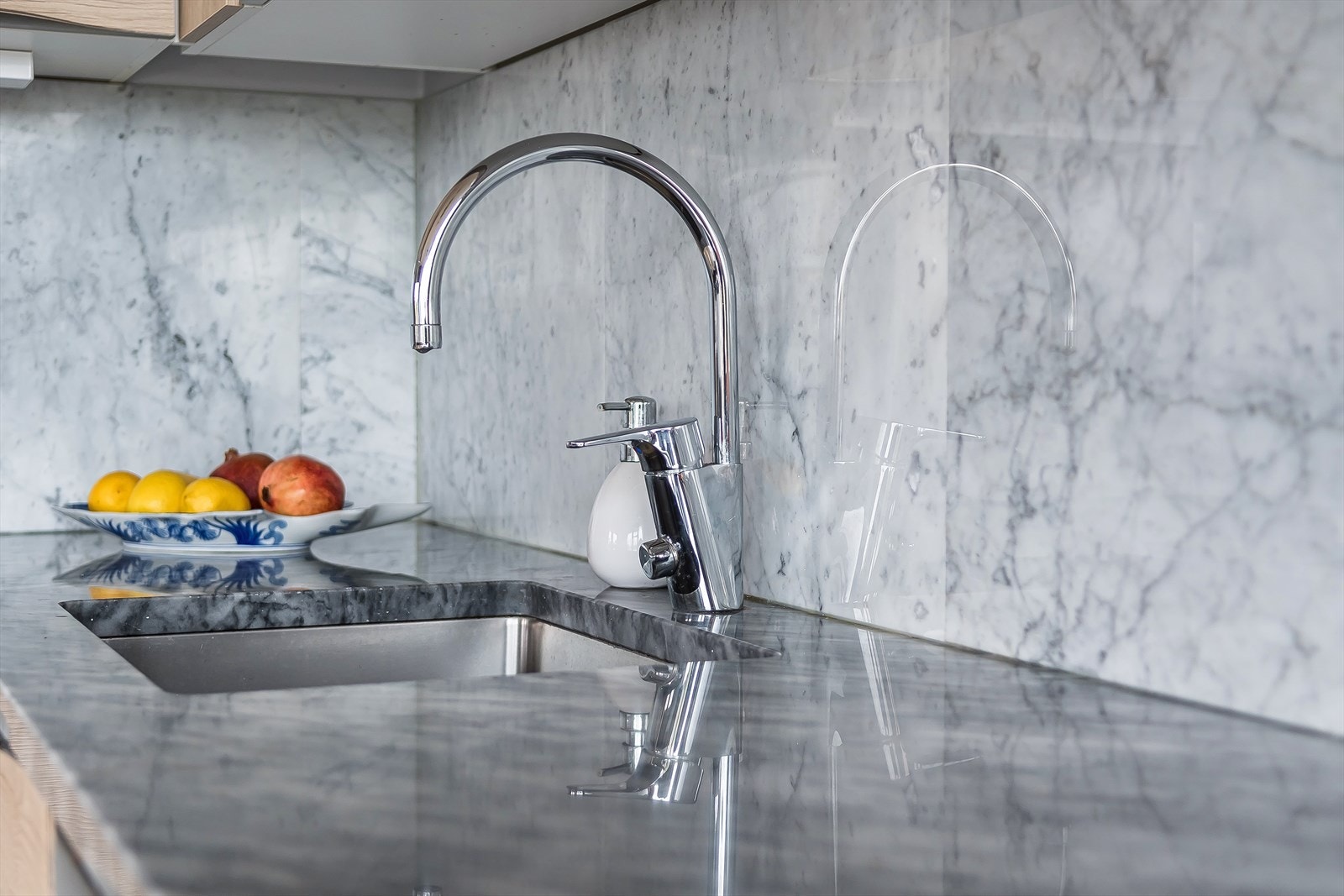 Den lekre marmor benkeplaten setter virkelig prikken over i en. Galleribilde