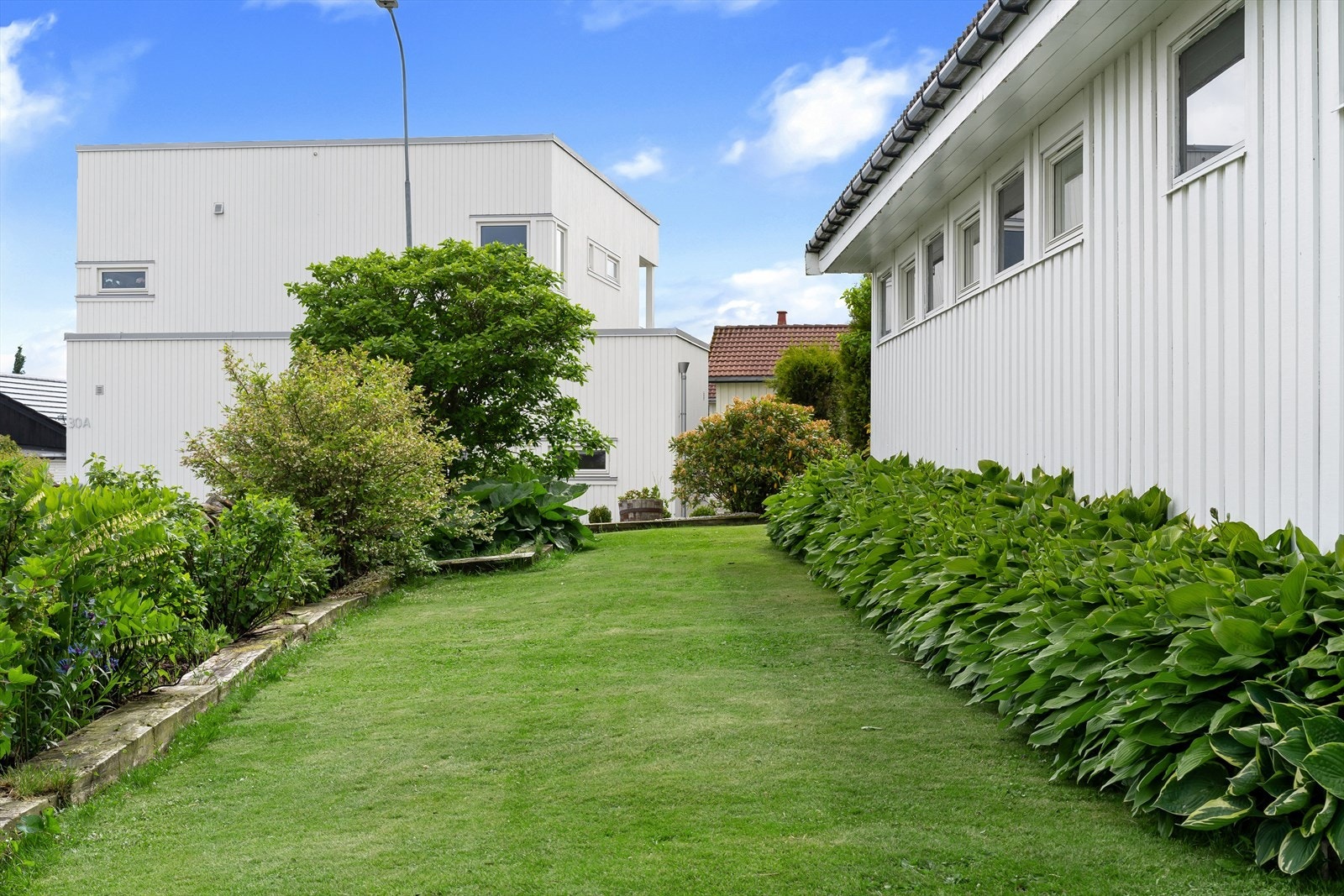 En herlig eiendom i rolig gate. Like ved skole og vannet. En sjelden sjanse på Ganddal - like ved skolen og vannet. Galleribilde