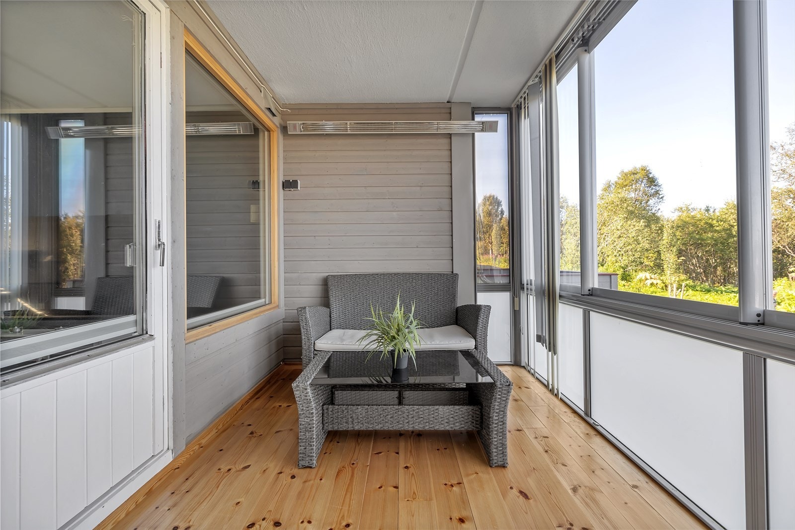 Den innglassede verandaen gir mulighet for utvidelse av utesesongen. Galleribilde