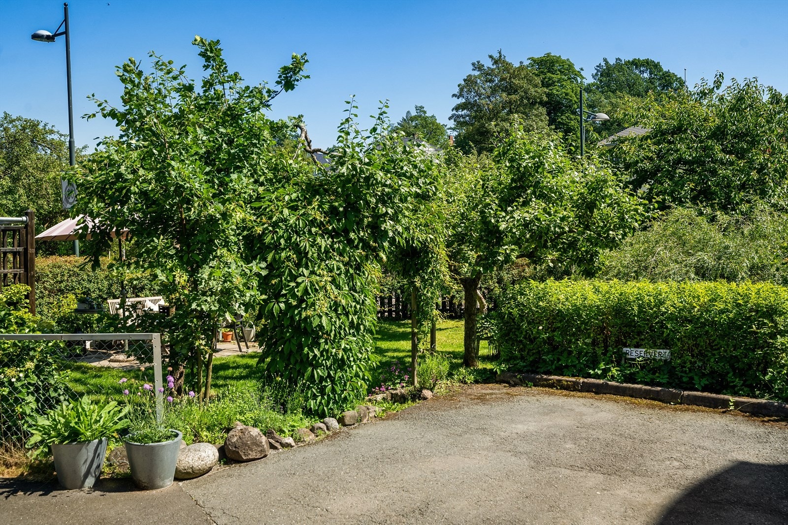 Medfølgende parkeringsplass tilhørende boligen Galleribilde