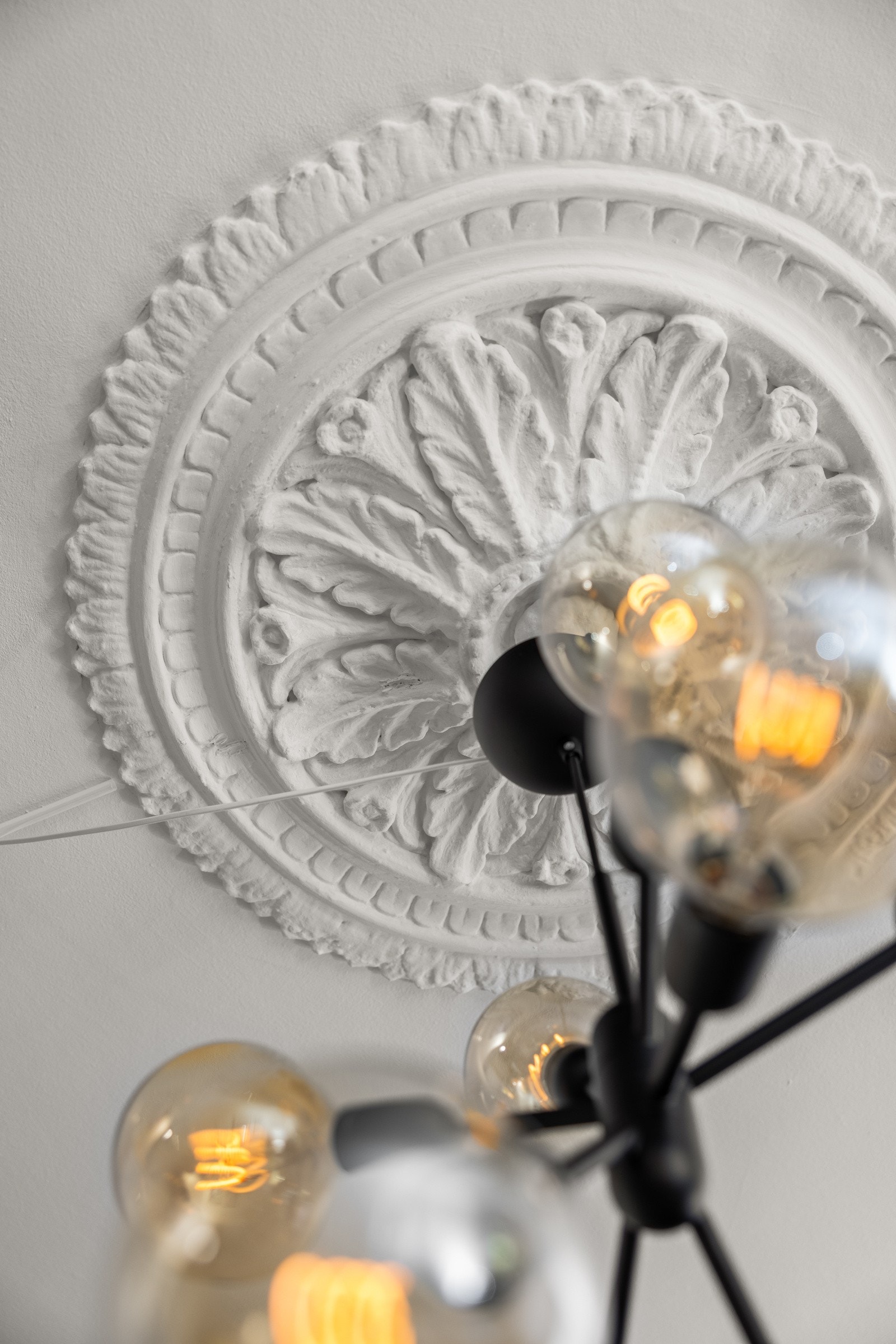 Rosett i himling i stue Galleribilde