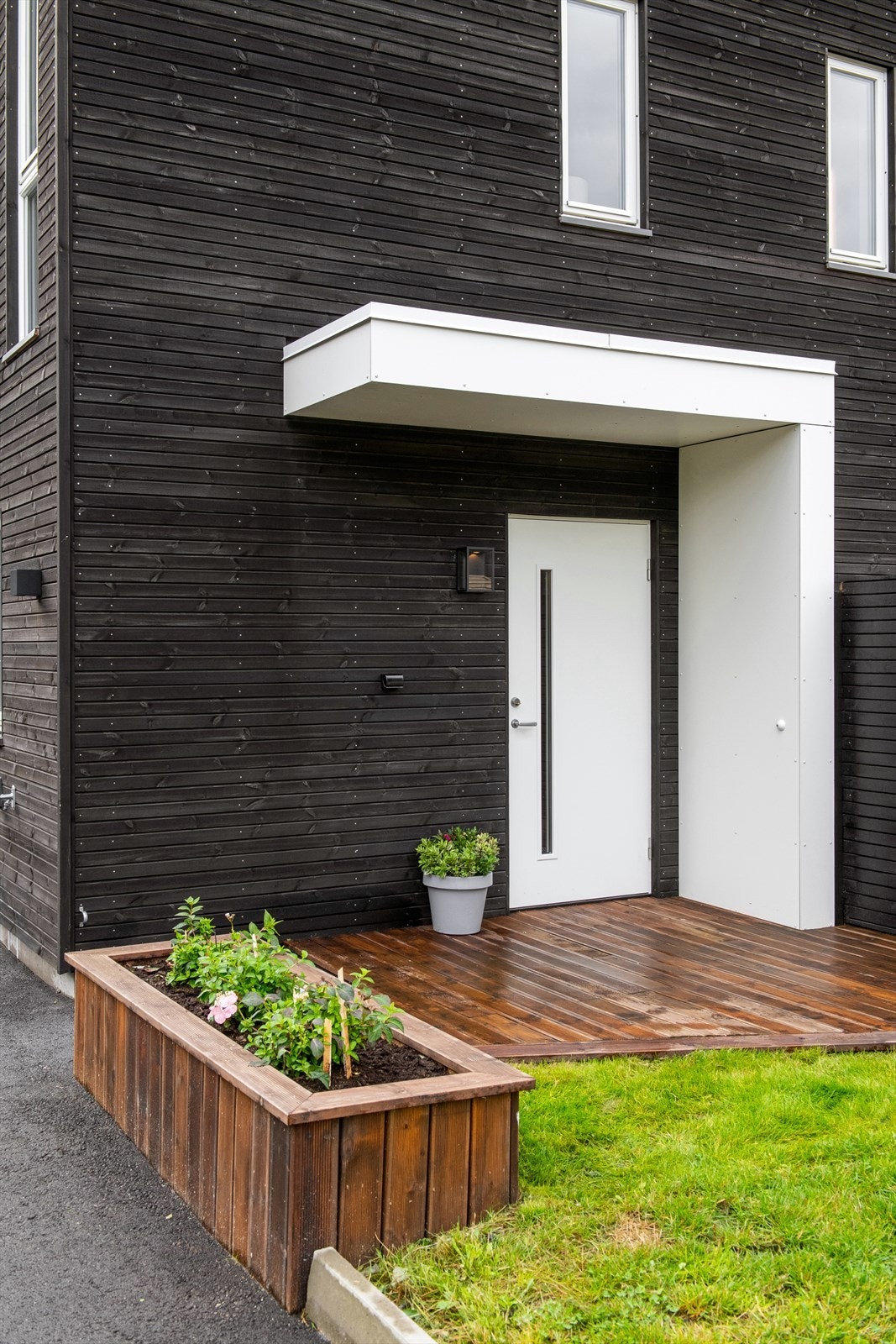 Skjermet overbygd inngangsparti Galleribilde