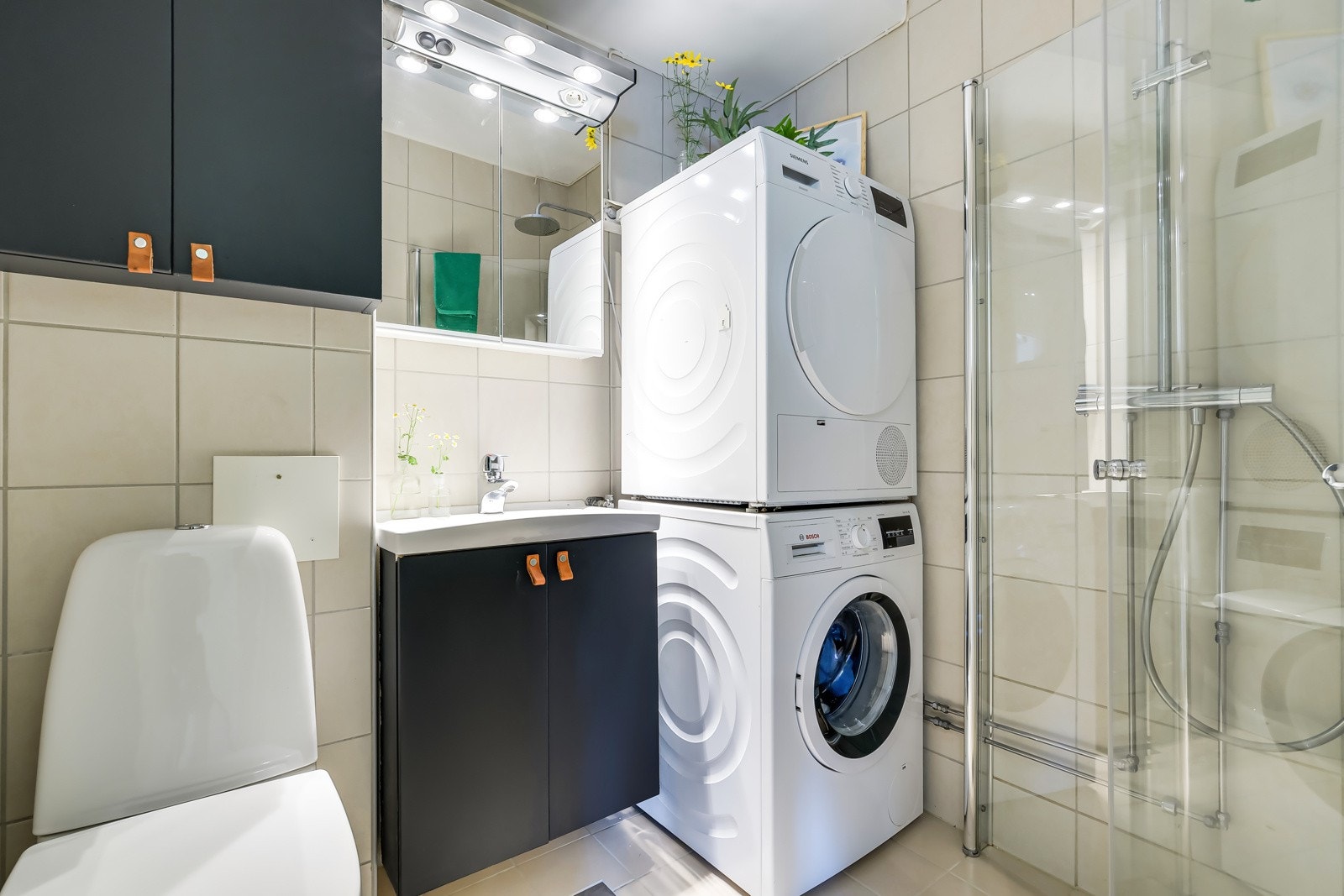 Flislagt bad med behagelig gulvvarme. Galleribilde