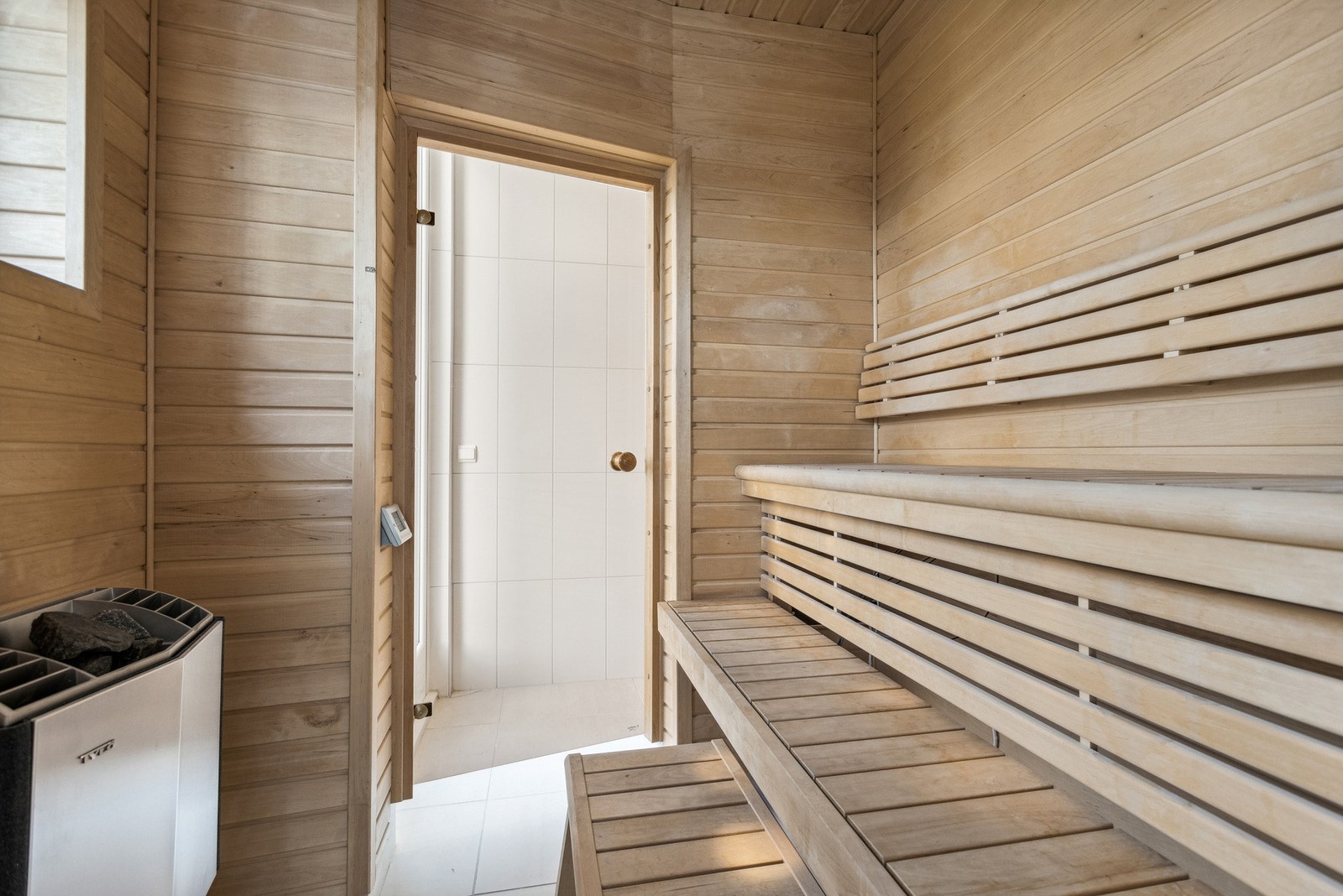 I tilknytning til garderobene og bassenget, er det etablert en badstue/sauna for ekstra velvære. Galleribilde