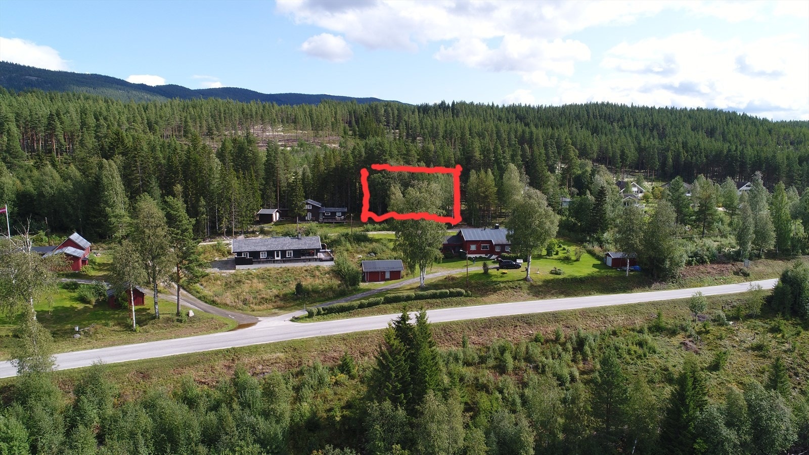 Hyttetomten. Galleribilde