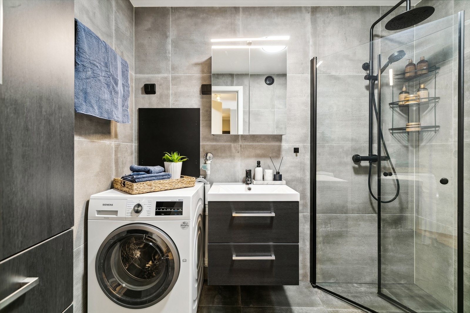 Baderommet har en gjennomført stil. Galleribilde