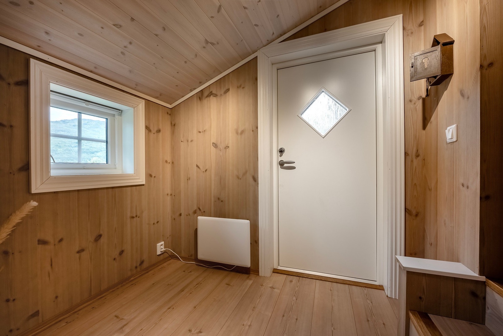 Innbydende entré til hytten. Galleribilde