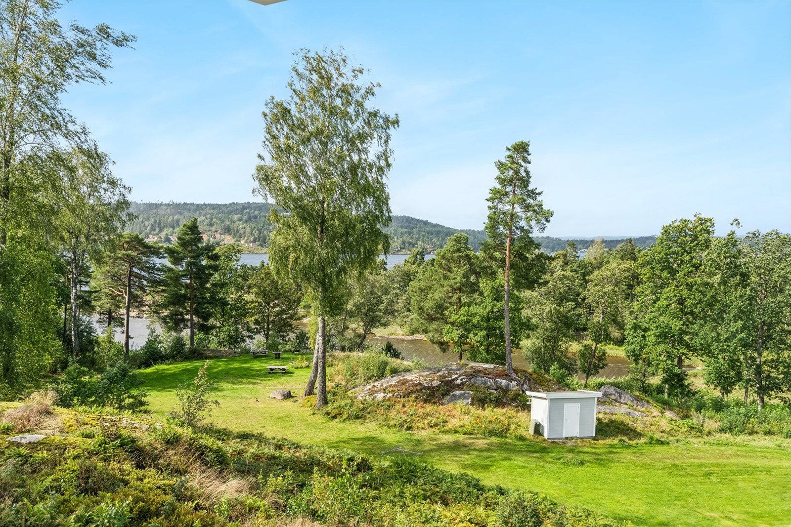 Flott utsikt fra balkongen til de hyggelige fellesarealene til borettslaget. Galleribilde