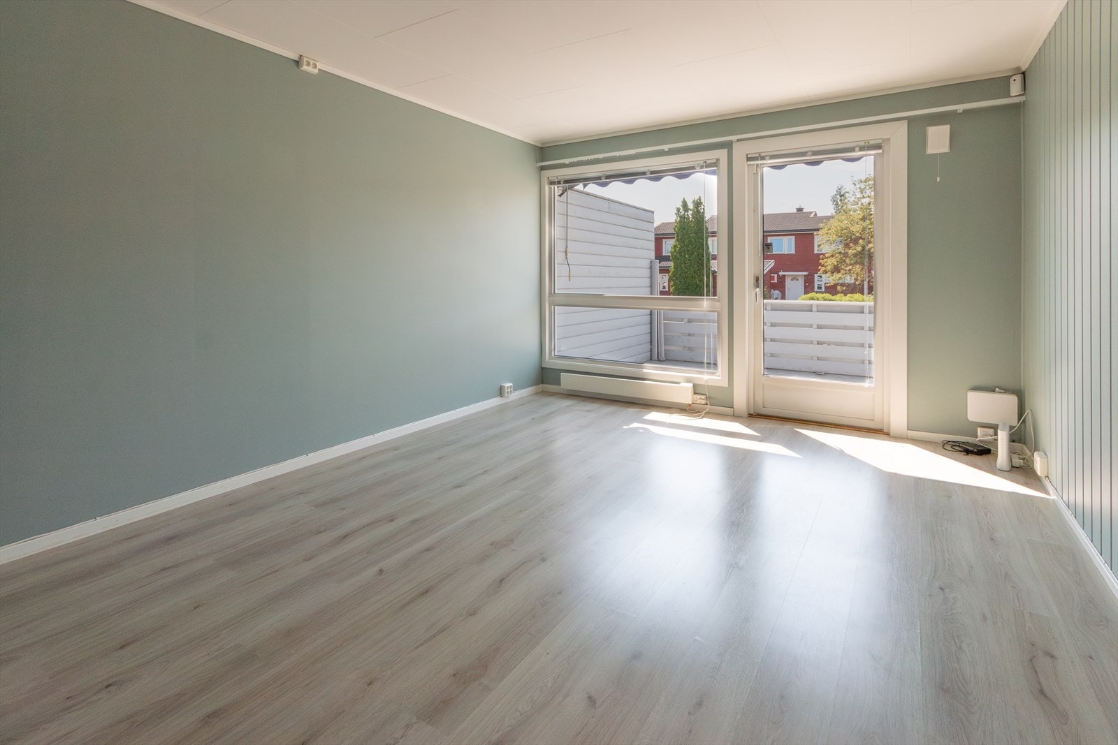 Stuen oppleves som enkel å møblere. Galleribilde