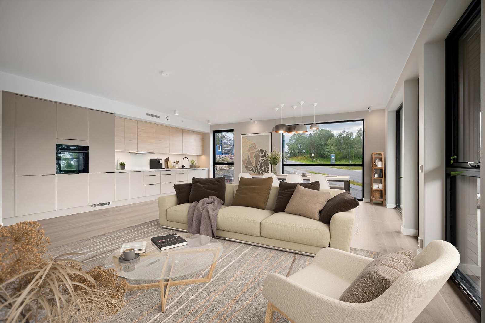 Stue/kjøkken i åpen og sosial løsning Galleribilde