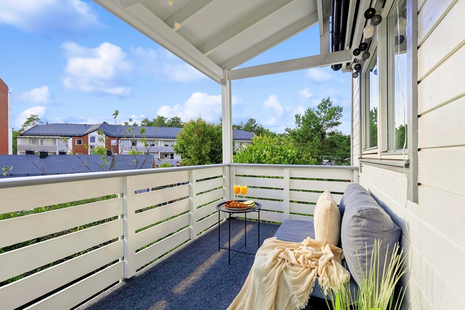 En hyggelig balkong hvor du kan nyte noe friskt i glasset. Galleribilde