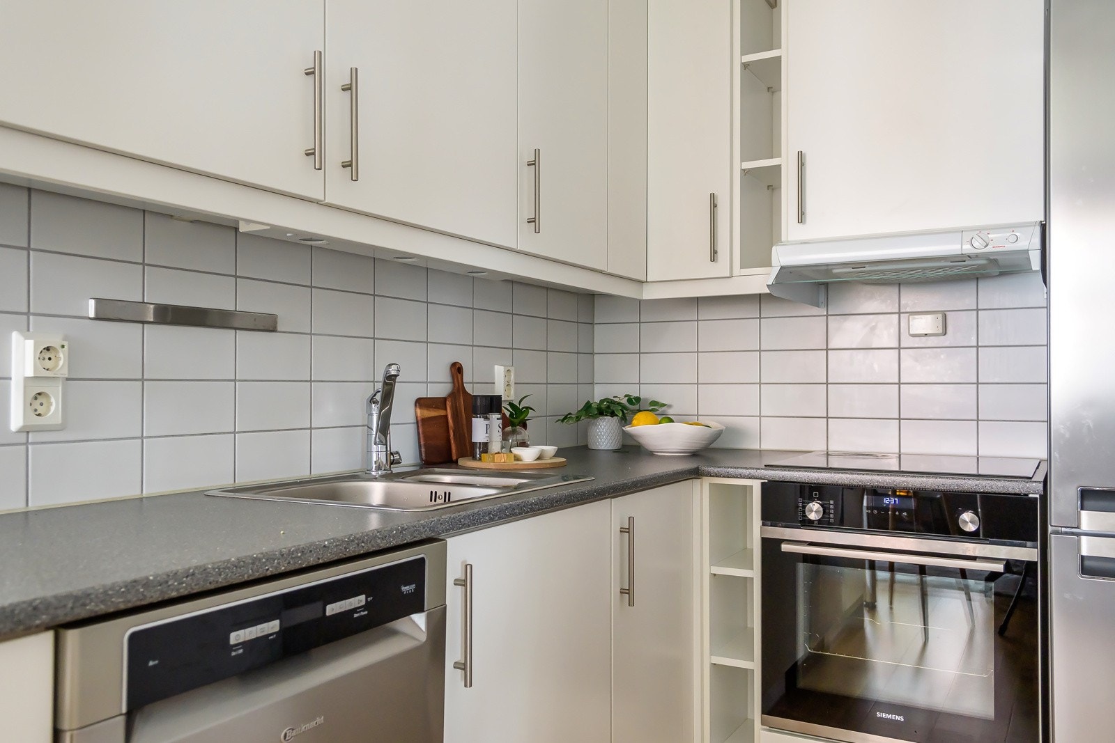 Her kan du kokkelere samtidig som du snakker med gjestene. Galleribilde