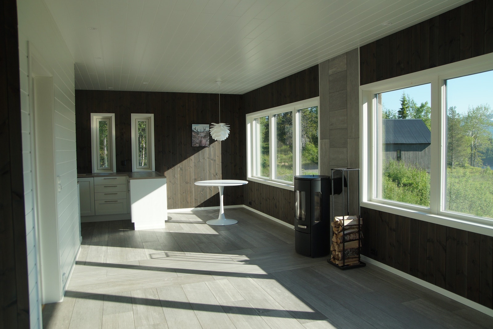 Livingroom with open kitchen Galleribilde