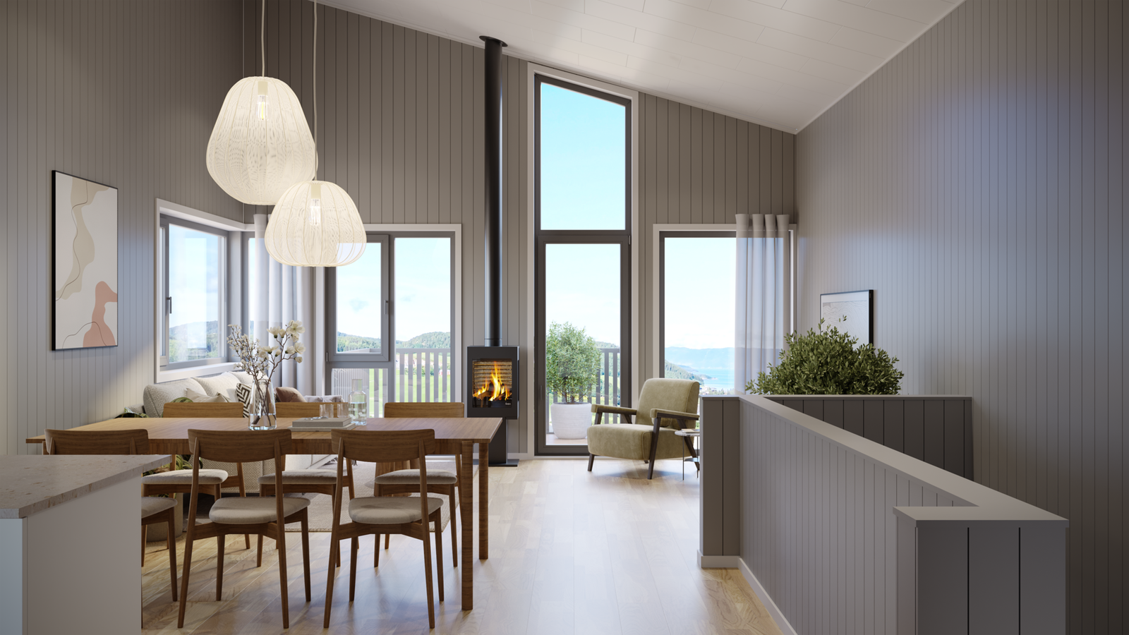 Store vindusflater gir godt med utsyn til sjøutsikten og godt med naturlig lys inn i stue/kjøkken. Galleribilde