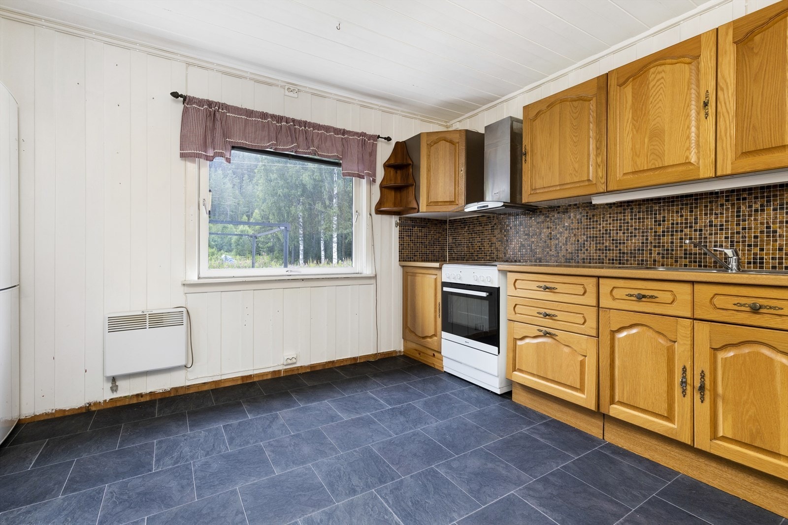 Hvitevarene medfølger ikke handelen. Galleribilde