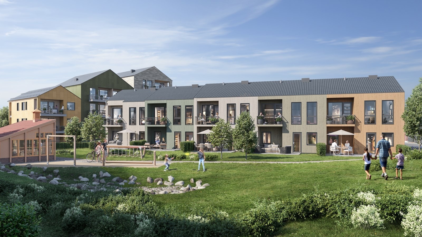 Skolegården får flotte grøntområder. Til venstre i bildet ligger felleshuset som skal bygges opp av materialer fra gamle Nanset skole. Galleribilde