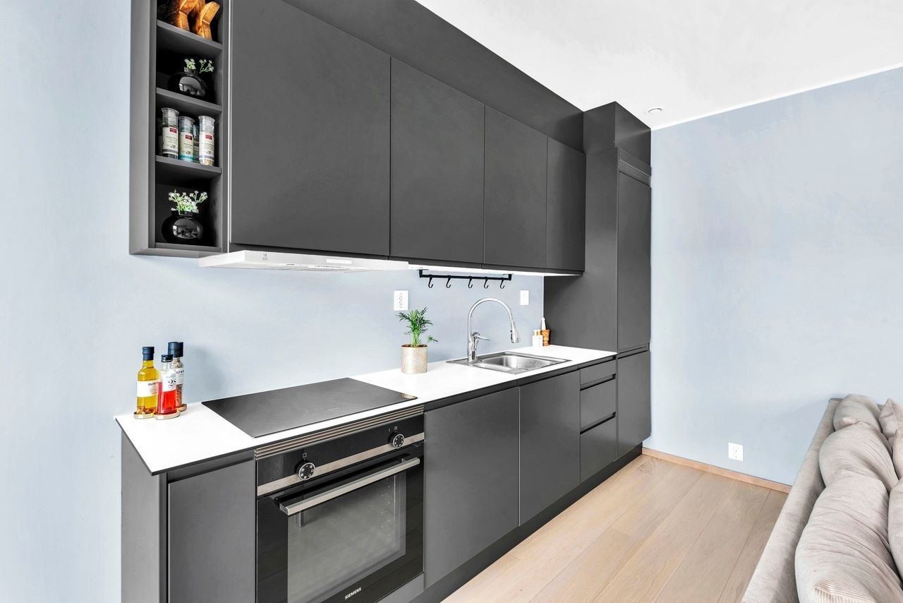 Moderne og lekkert kjøkken fra Sigdal med integrerte hvitevarer. Galleribilde