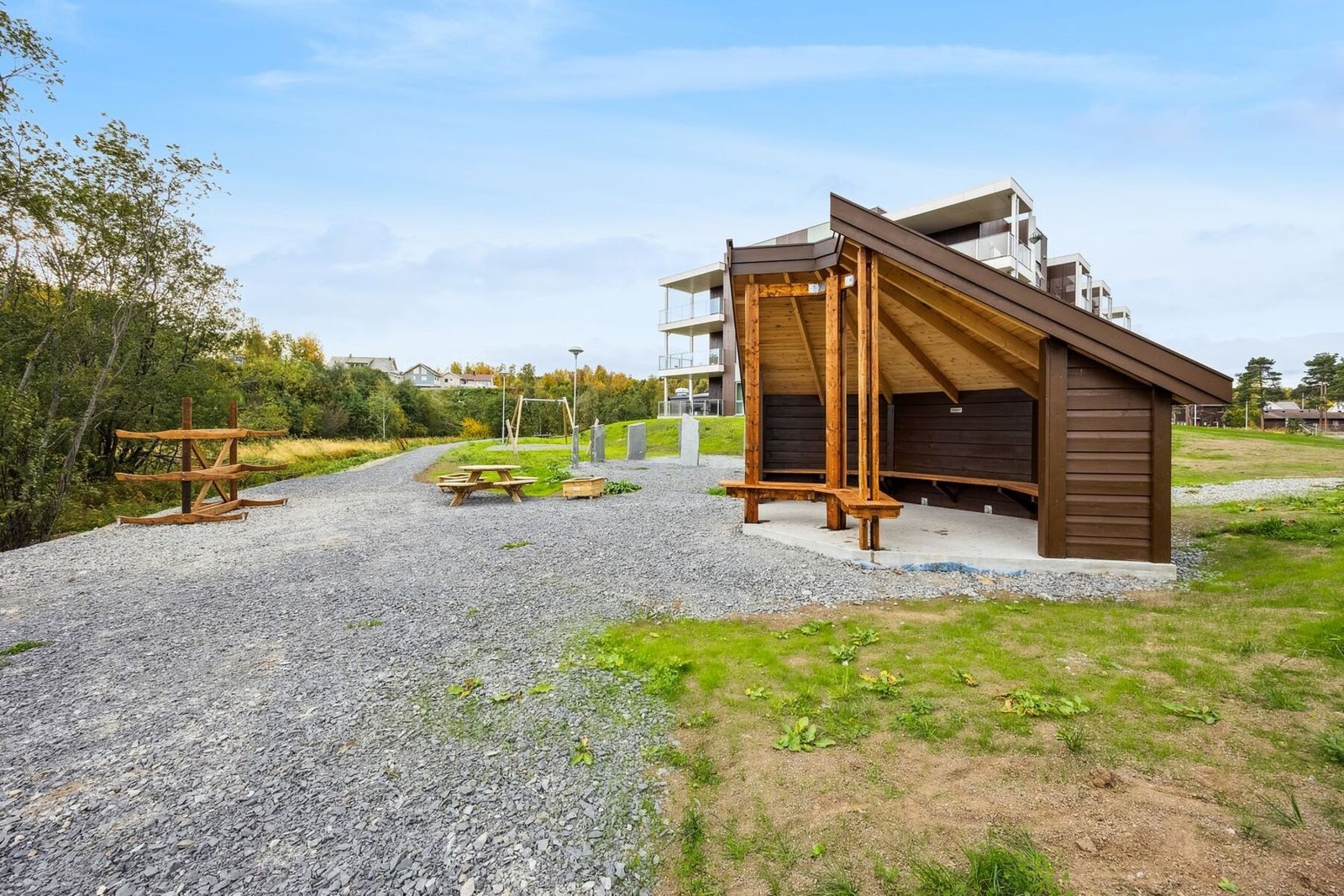 Fellesareal, lekeplass og felles utestue. Galleribilde