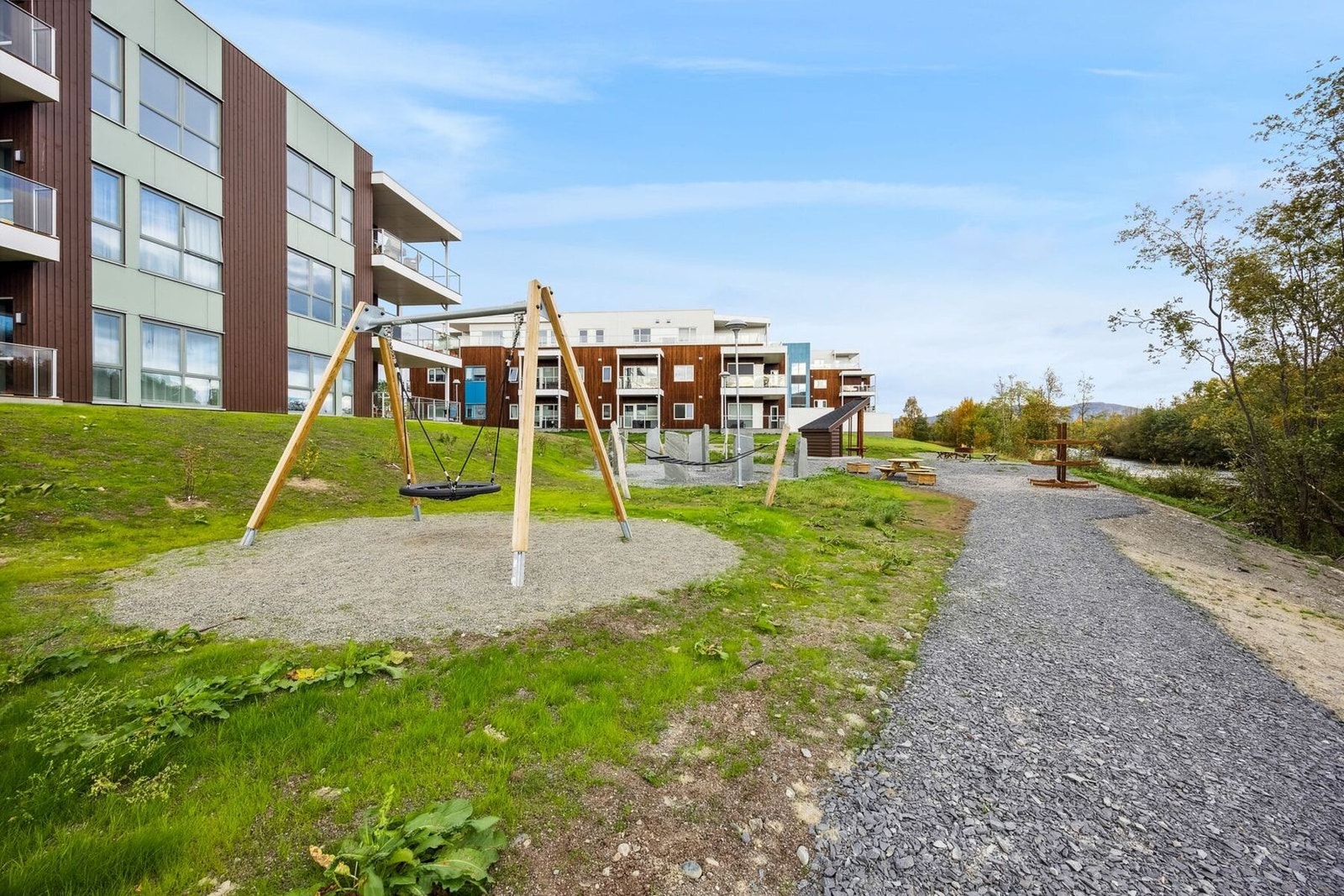 Fellesareal, lekeplass og felles utestue. Galleribilde