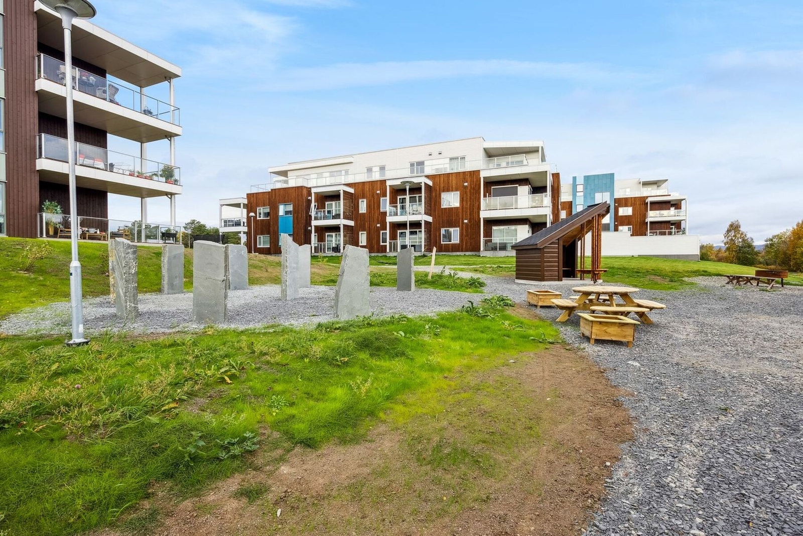 Fellesareal, lekeplass og felles utestue. Galleribilde