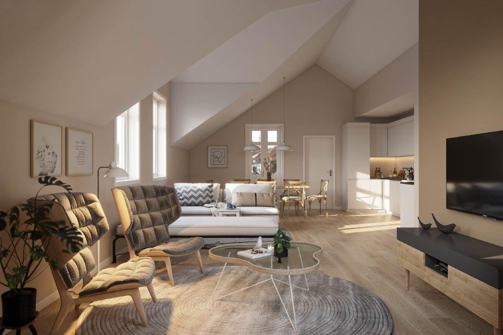 Leiligheten i 2.etg får også et flott oppholdsrom med god takhøyde opp under mønet Galleribilde