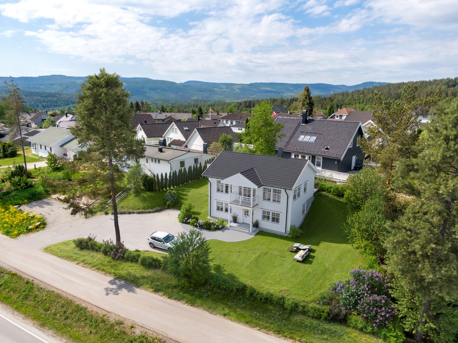 Huset vist på tomten Galleribilde