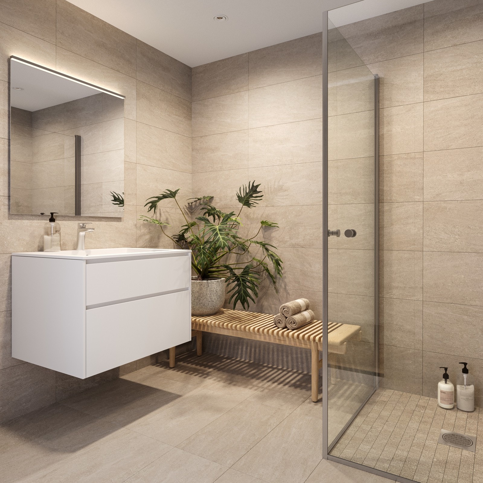 Badene får lekre og har moderne kvaliteter. De beige flisene gir et varmt og innbydende uttrykk. Galleribilde