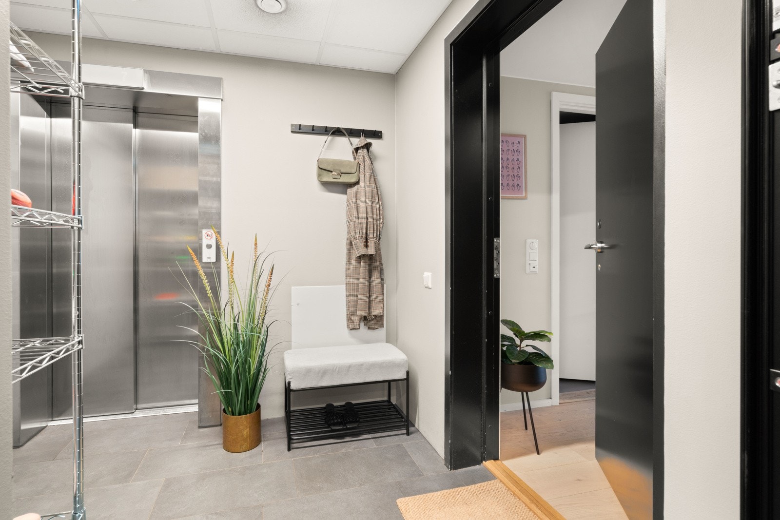 Ta heisen rett opp i din leilighet - utenfor inngangsdøren er det en gang som eier har ekslusiv tilgang til. Galleribilde