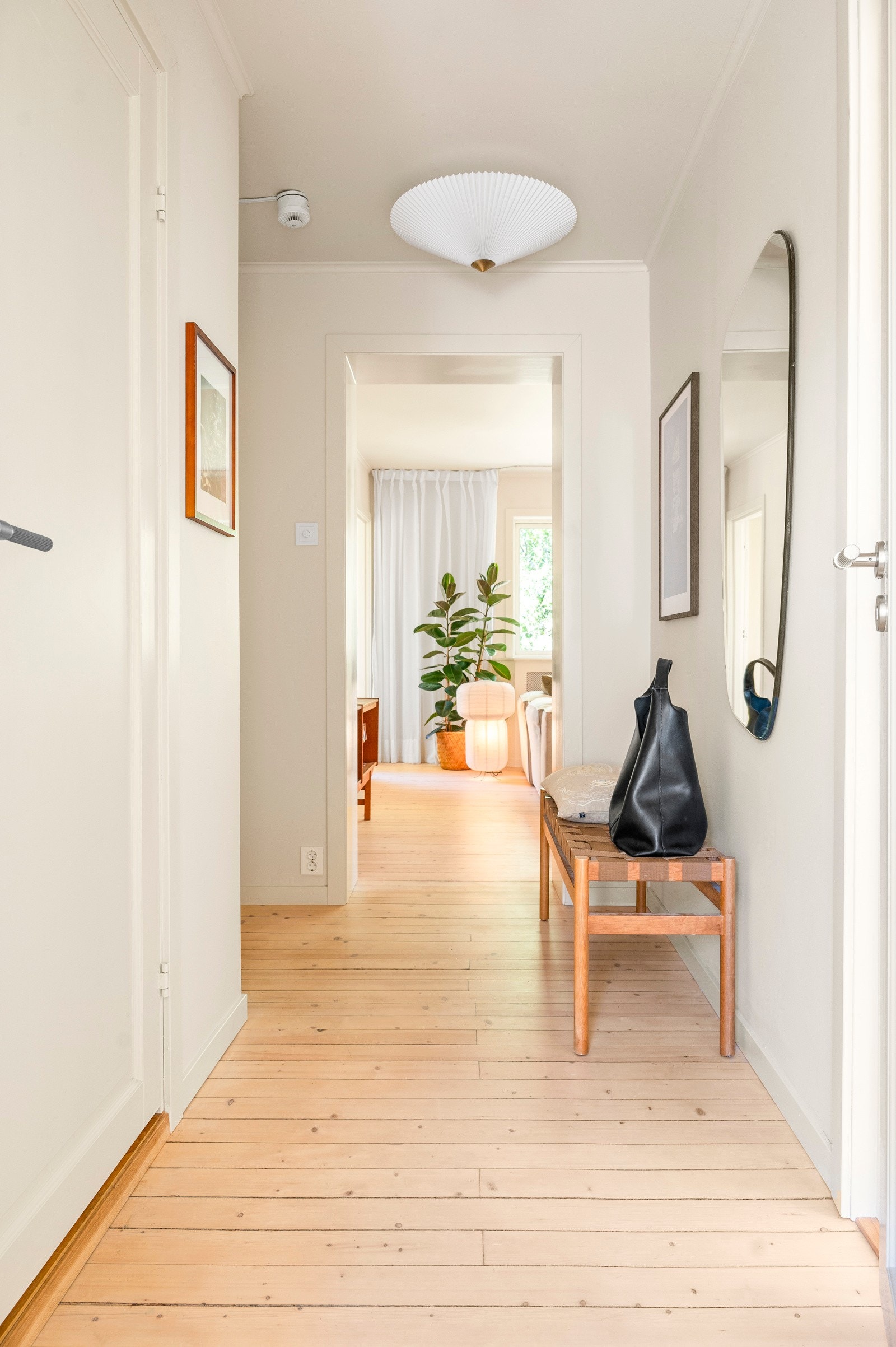 Entréen gir et godt førsteinntrykk av leiligheten. Galleribilde