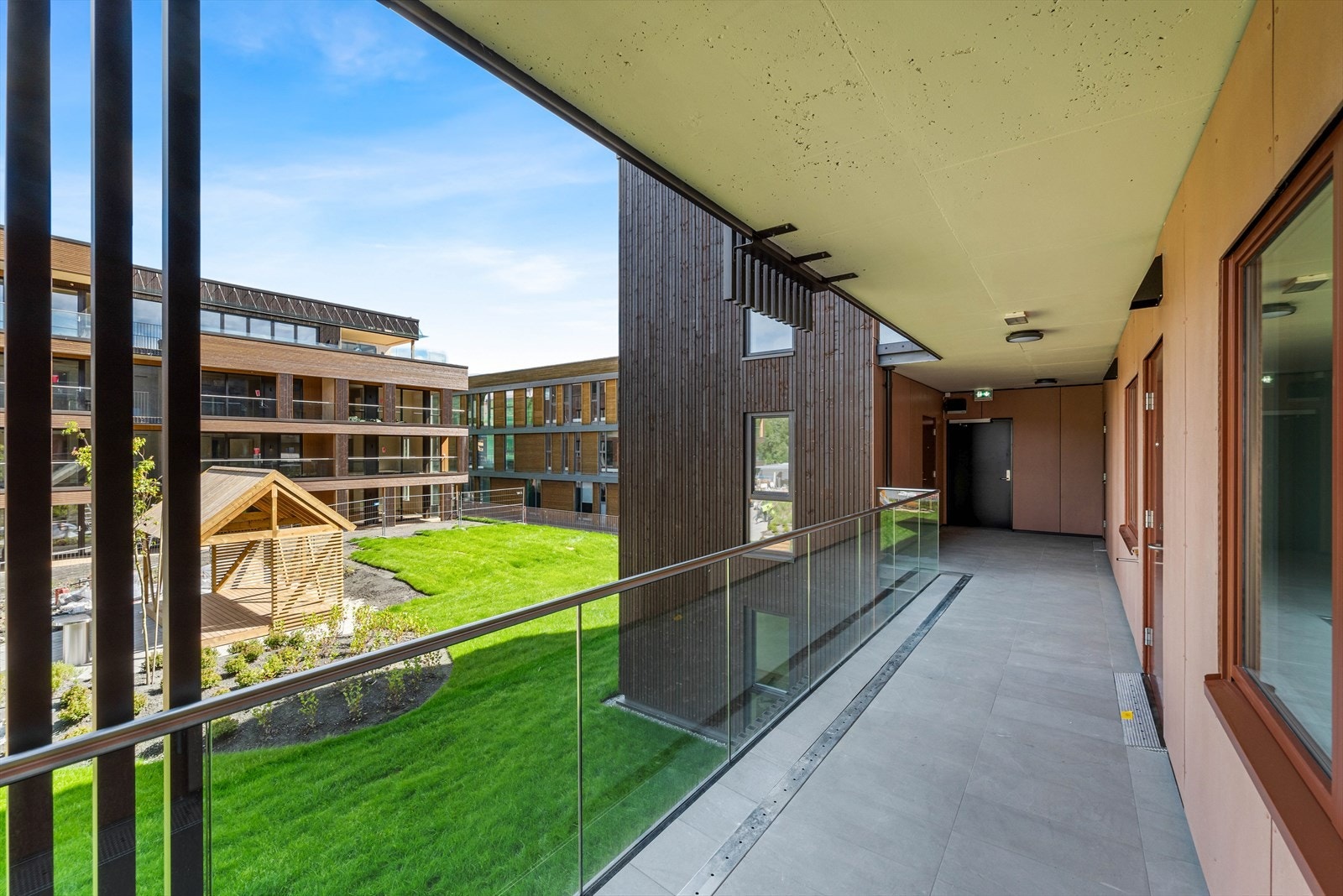 Fra adkomsten til leiligheten finner du takhagen mellom Bygg C og D. Galleribilde