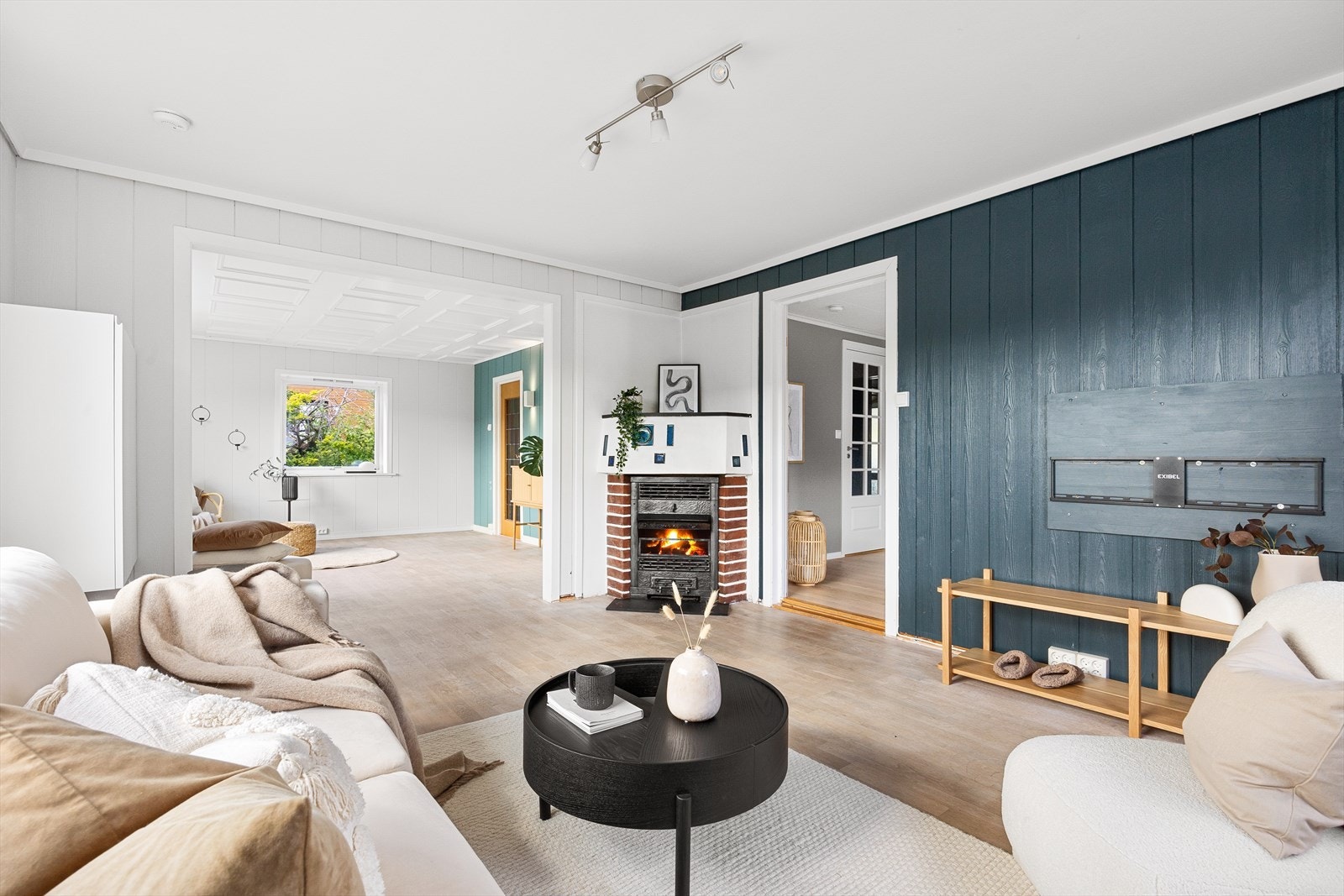 Stuen deles naturlige inn i ulike soner Galleribilde