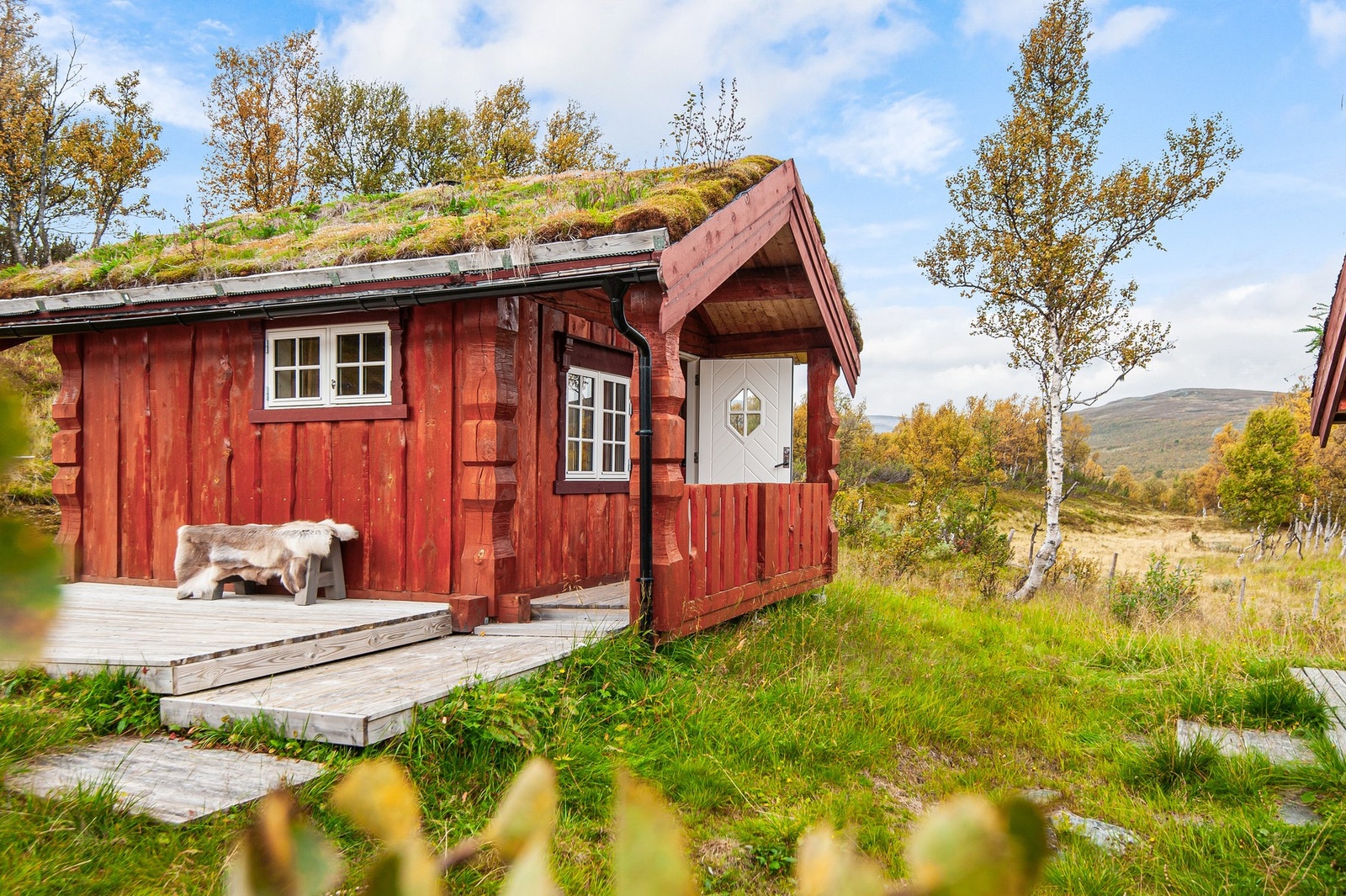 Koselig anneks med tilhørende platting. Galleribilde