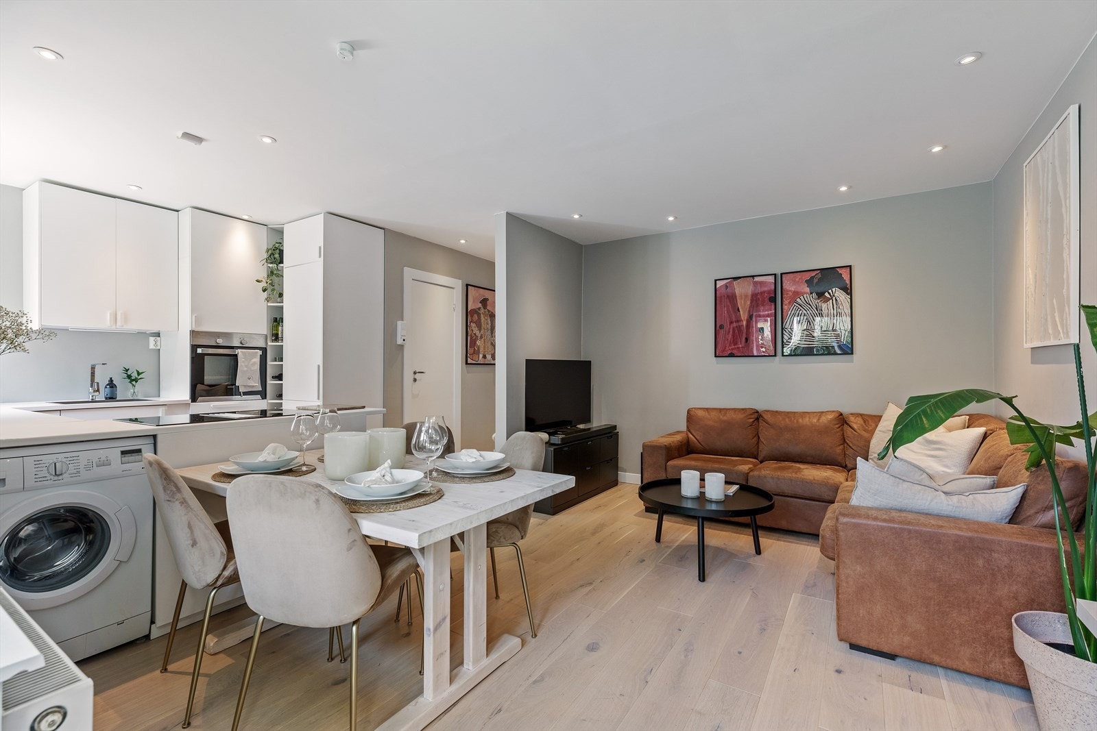 Praktisk plassert vaskemaskin som er et godt tilskudd til fellesvaskeriet Galleribilde