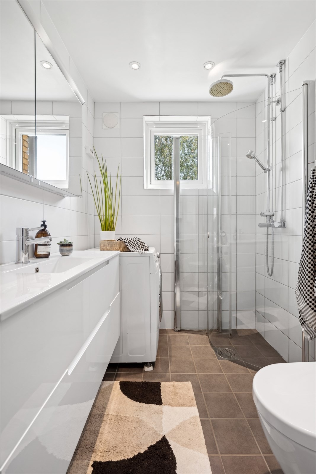 Flislagt baderom som ifølge eier ble pusset opp i 2013. Galleribilde