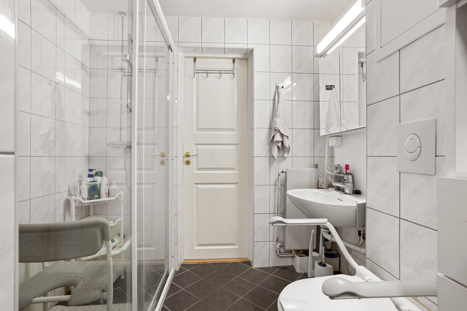 Badet har opplegg til vaskemaskin. Galleribilde