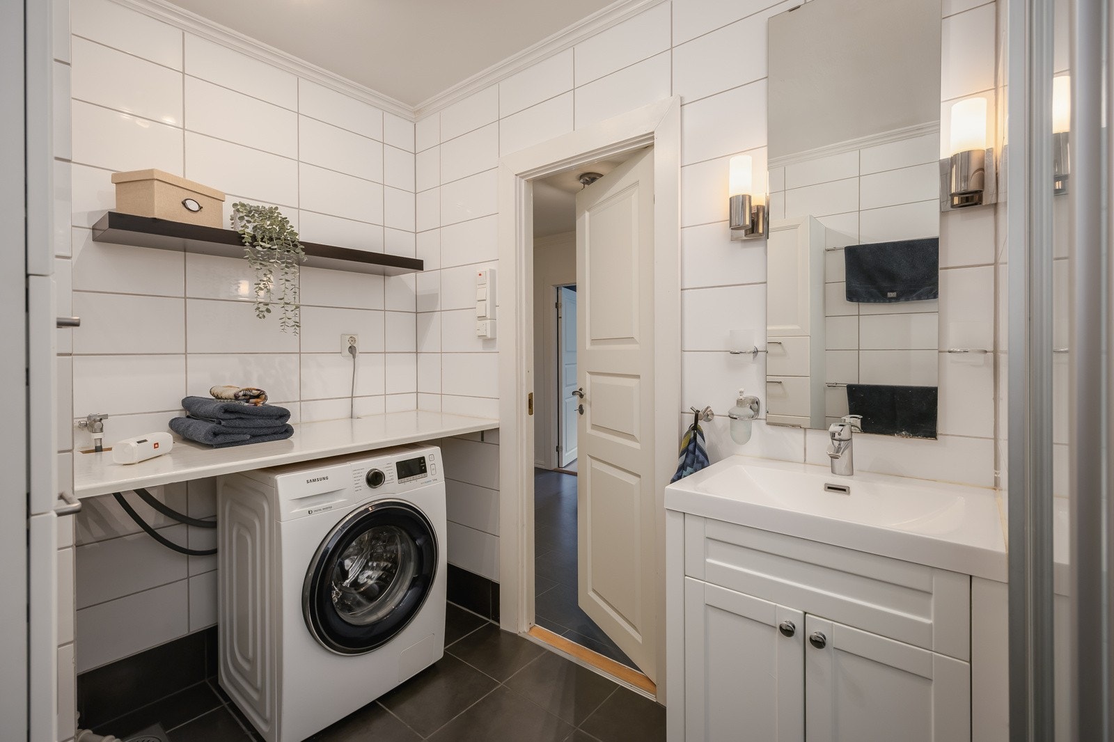 Badet har opplegg for vaskemaskin. Galleribilde