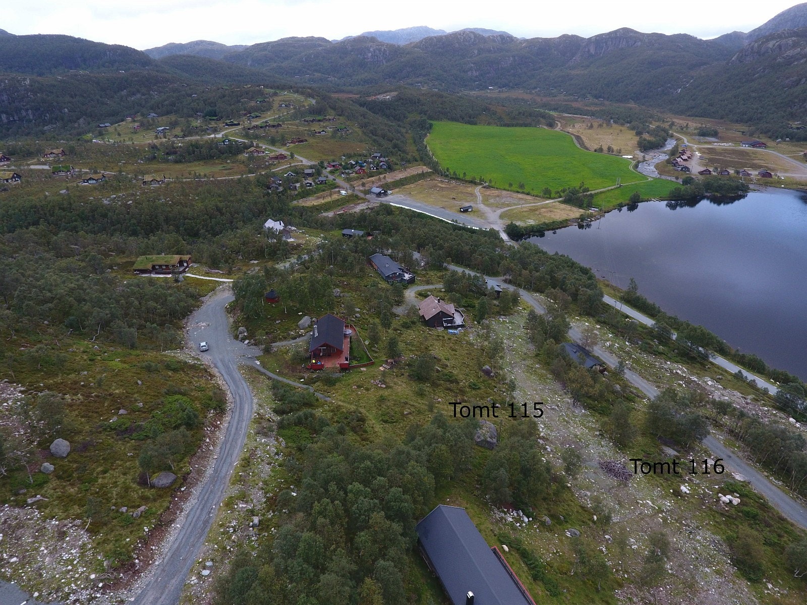 Tomter mot øst nederst på feltet 115 og 116 Galleribilde