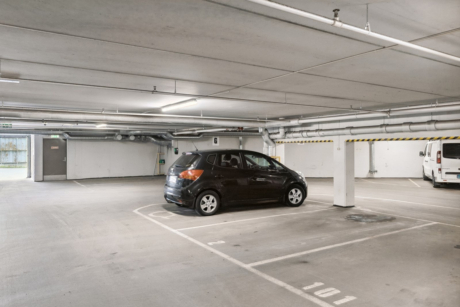 Det medfølger en garasjeplass i sameiets felles anlegg. Galleribilde