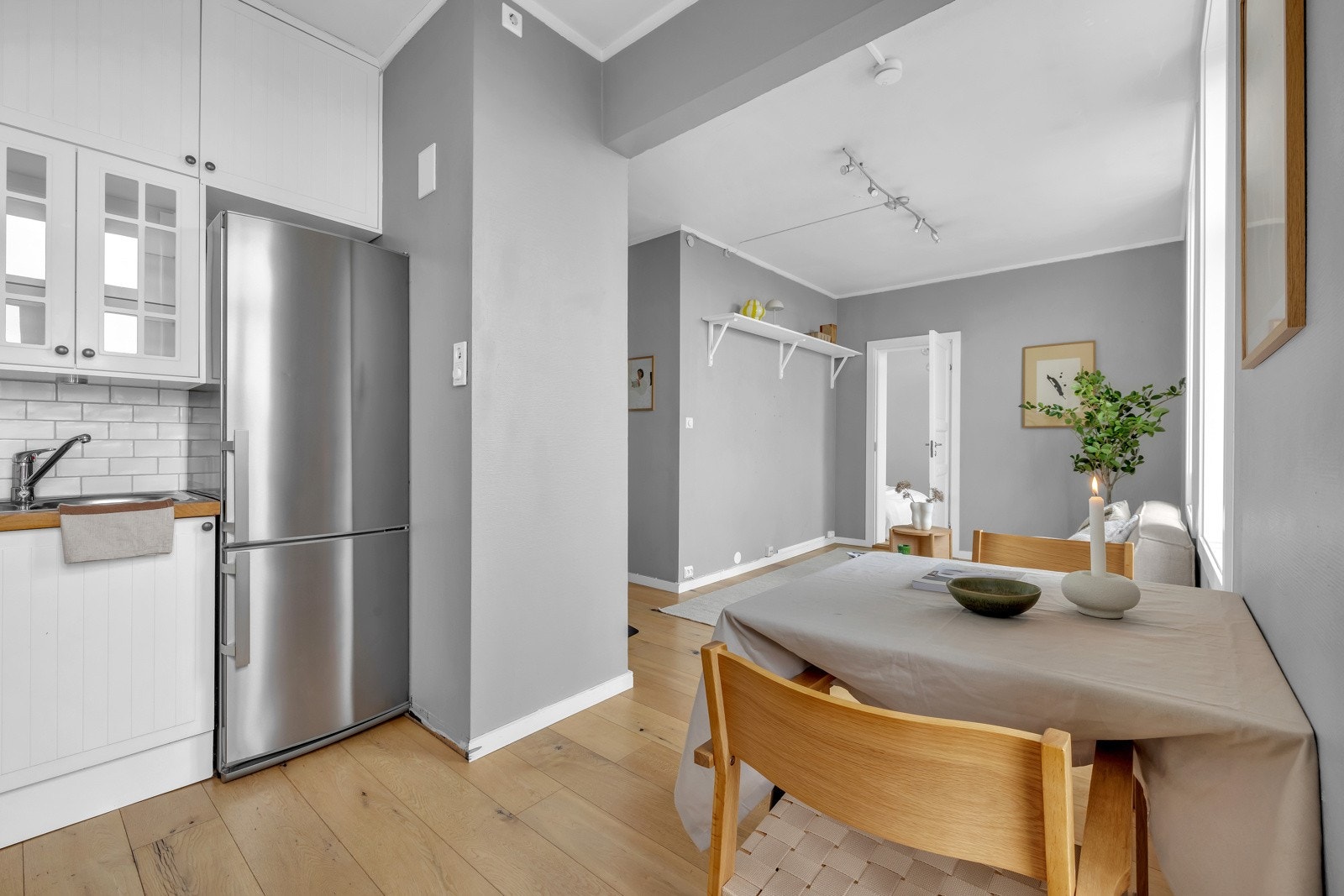 Leiligheten har en åpen og sosial planløsning. Galleribilde