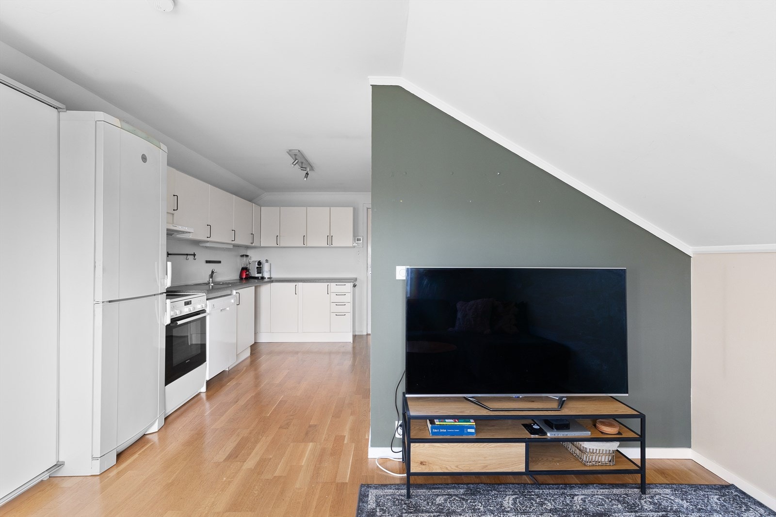 Åpen løsning mellom stue og kjøkken Galleribilde