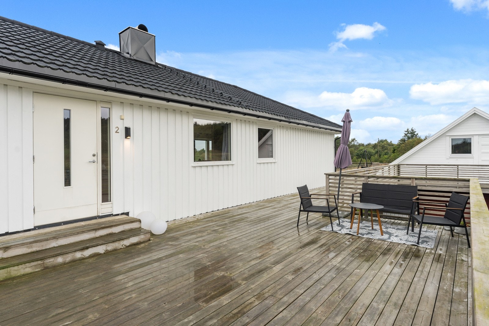 Innbydende velkomst ved inngangspartiet. Galleribilde