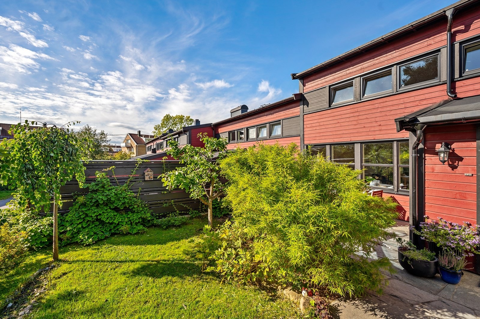 En liten oase ved inngangspartiet hvor du fritt kan plante og dyrke det du måtte ønske. Galleribilde