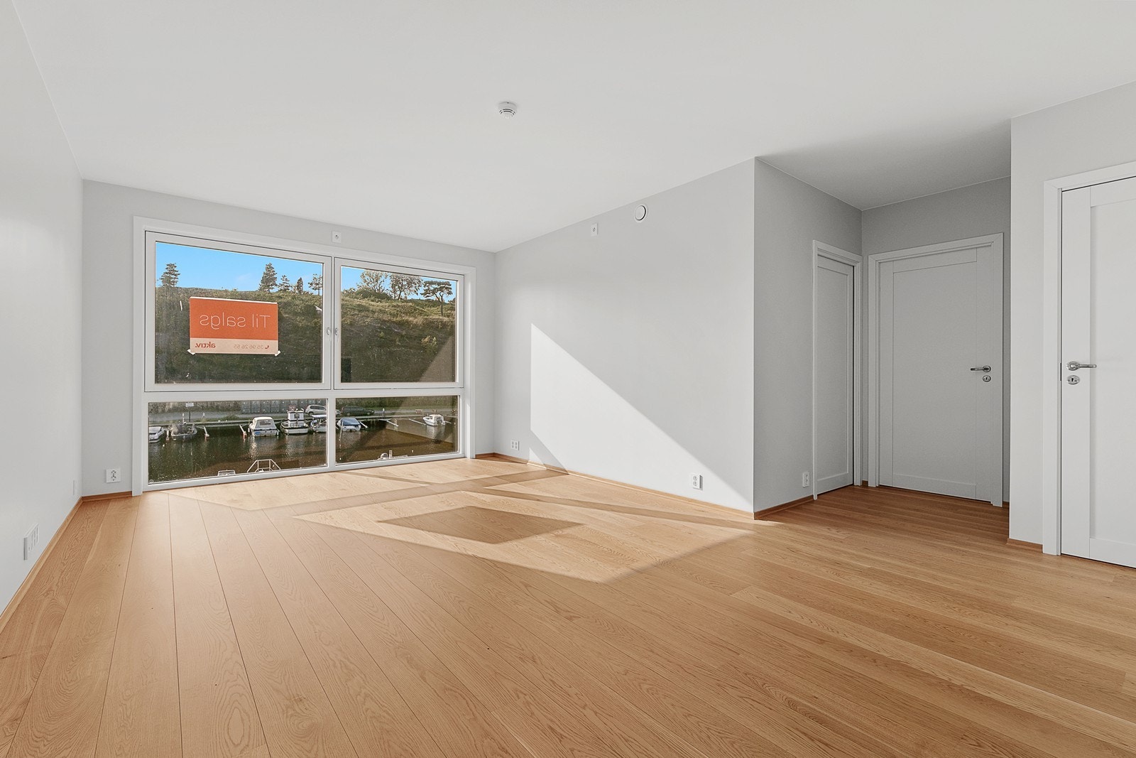 Videre inn i åpen stue/kjøkkenløsning Galleribilde