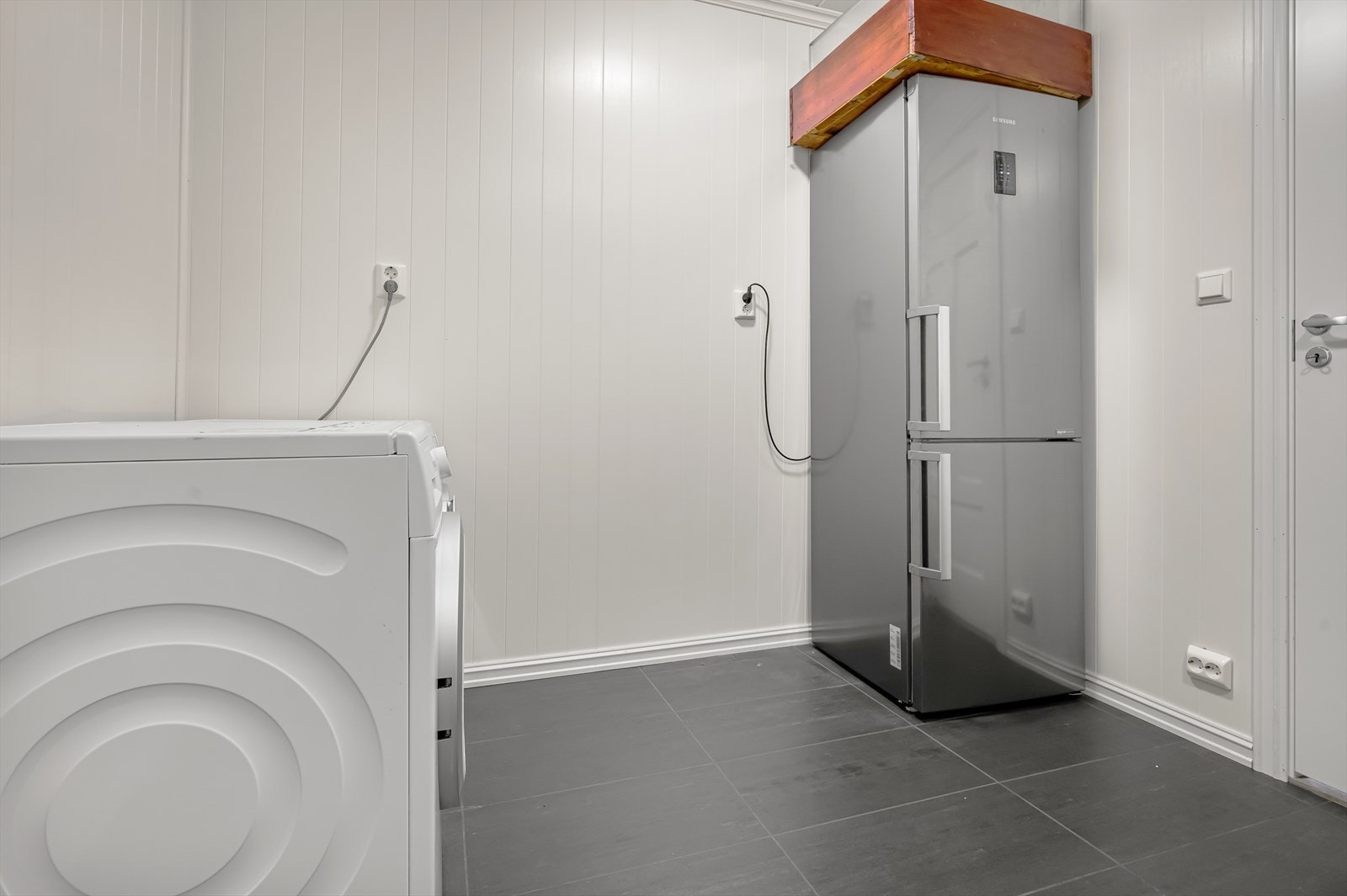 Flislagt vaskerom. Galleribilde