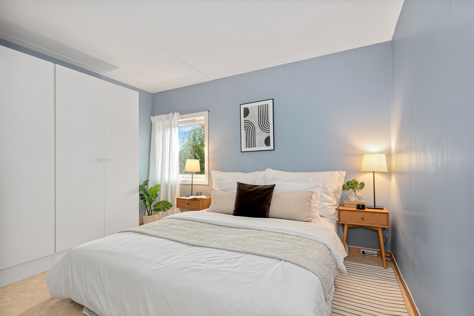 Hovedsoverom med dobbelt garderobeskap Galleribilde